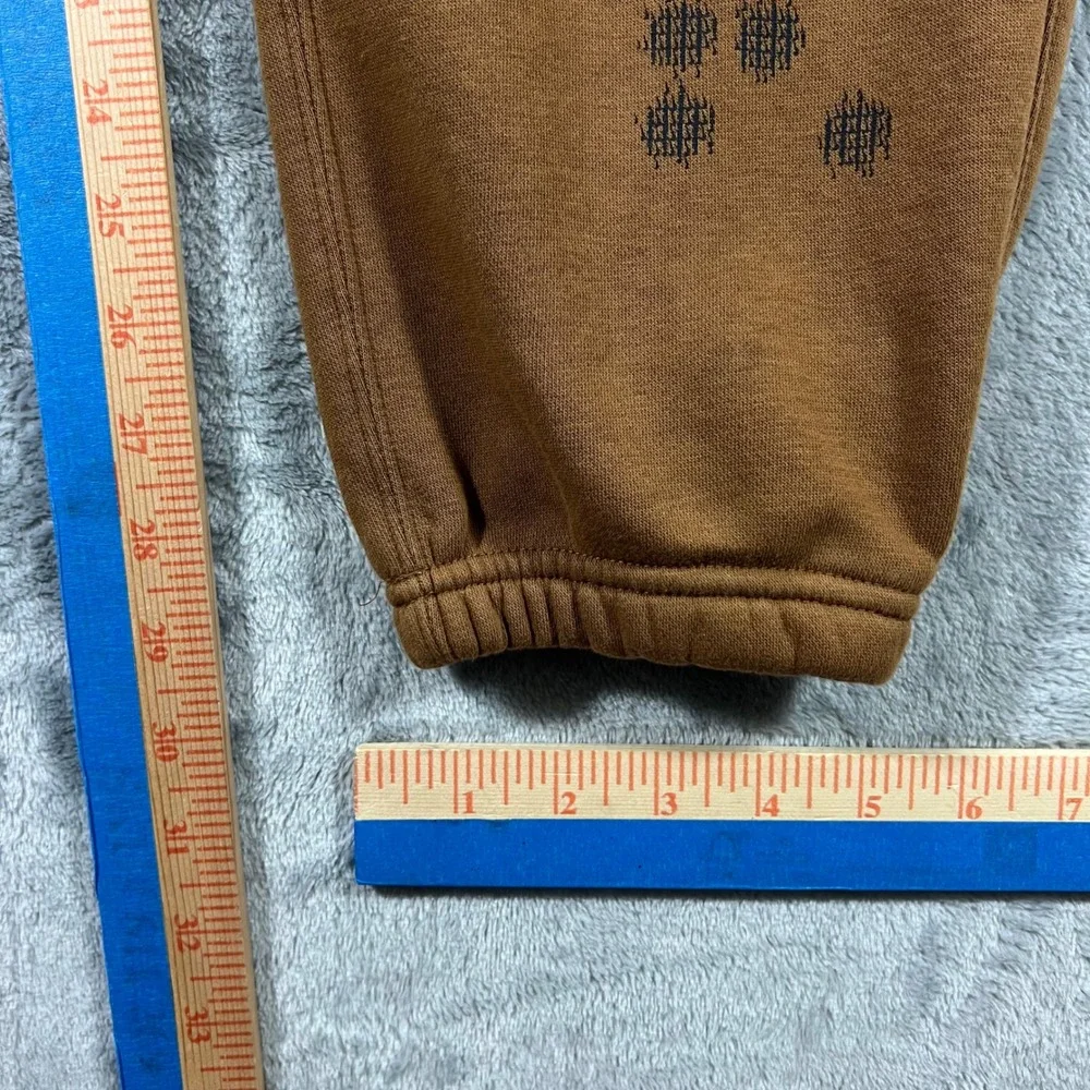 NIKE‎ Sportswear Club Cuffed Fleece Pants Mens Large Brown IM7828-235 Graphic